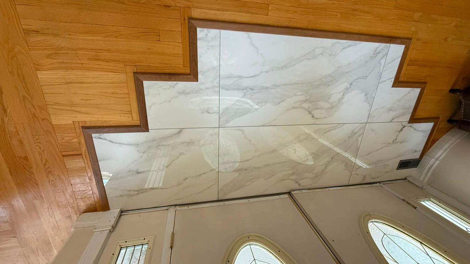 Marble tile feature wall at entryway