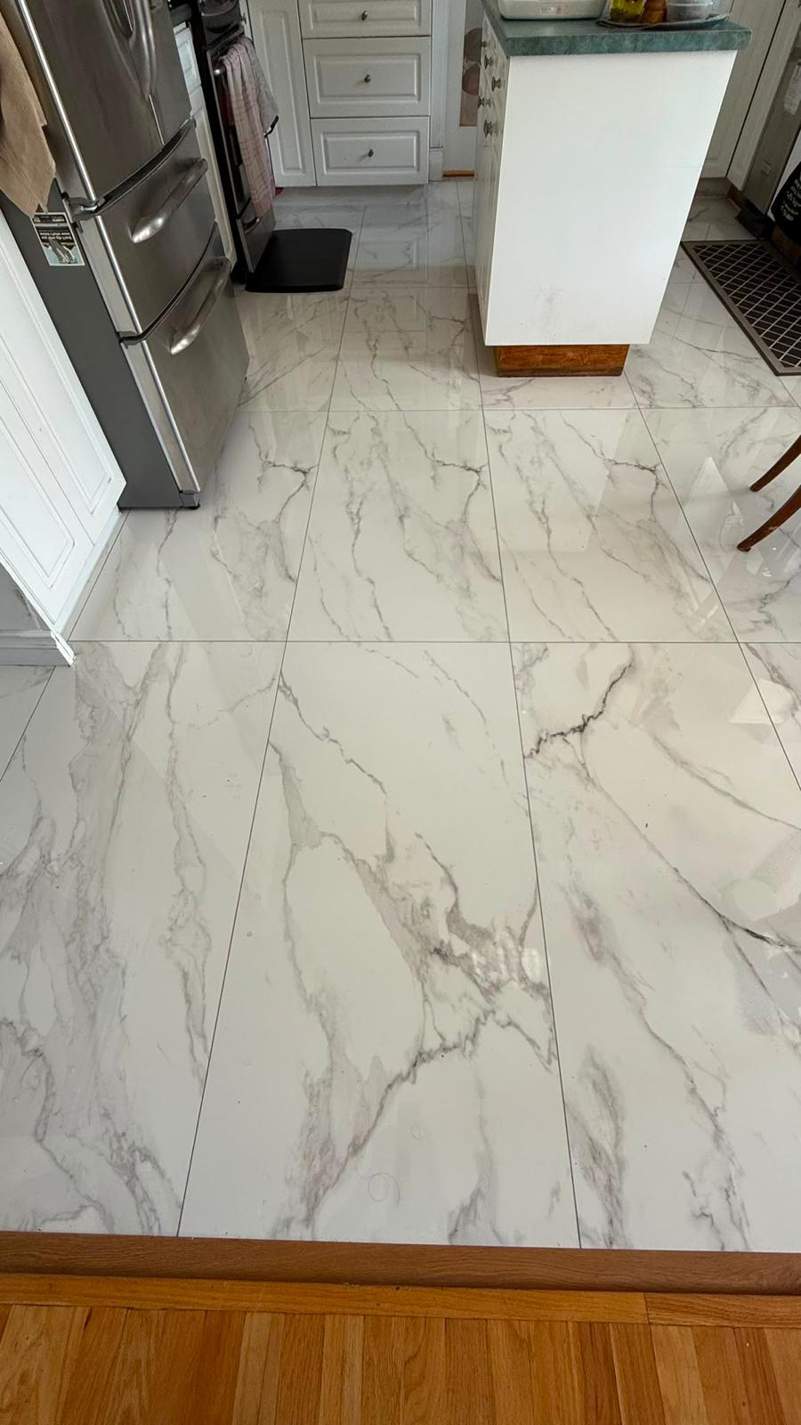 Large-format marble look tile flooring